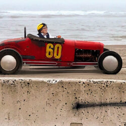 Guided Tour of Joan's Blog: Joan Garry in a race car on the beach