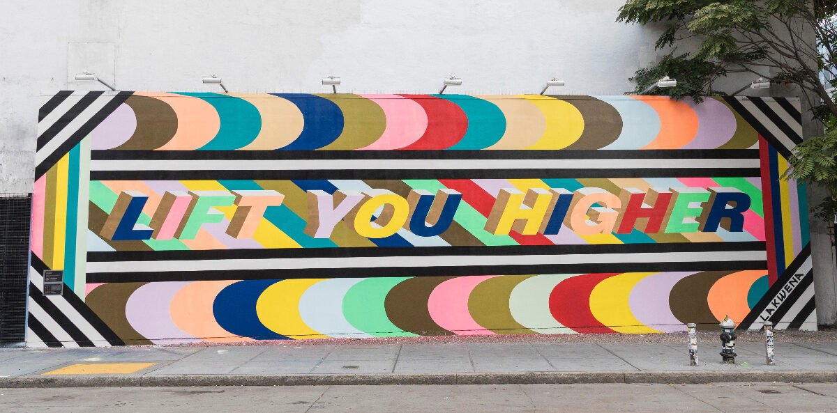 nonprofit leadership - lift you higher painted on a concrete wall with multiple colors
