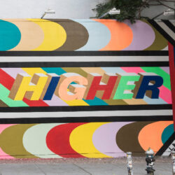 nonprofit leadership - lift you higher painted on a concrete wall with multiple colors